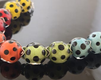 Handmade Lampwork Beads: Multi-colored encased with Black Dots Set of 10 Beads (5 Matching Earring Pairs)