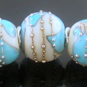 Made To Order (MTO) –Handmade Light Turquoise with Splashes of Ivory decorated with Fine Silver Trail Round Lampwork Beads