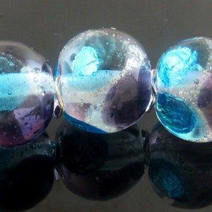 Handmade Silver Aqua and Violet encased round Lampwork Bead Set