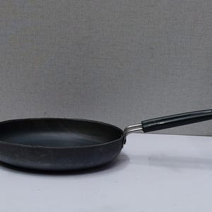 May include: A black ceramic mug with the text "But First, Coffee" in white script. The mug has a glossy finish and a simple, modern design. Perfect for enjoying your morning coffee or tea.