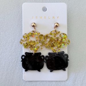 Sprankelende ketelhangoorbellen: Halloween-heksensieraden