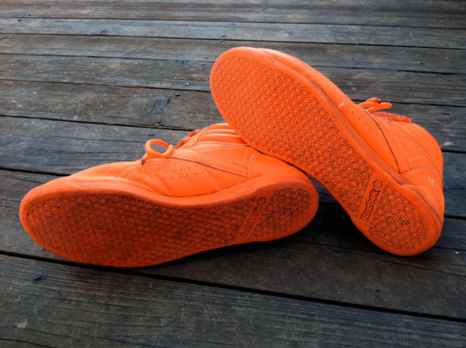 orange reebok high tops
