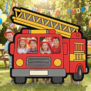 May include: A bright red fire engine cardboard cutout with a yellow ladder. Several children in firefighter helmets are looking out of the windows. A banner in the background reads "HAPPY BIRTHDAY". The scene is set outdoors, with balloons and party decorations.