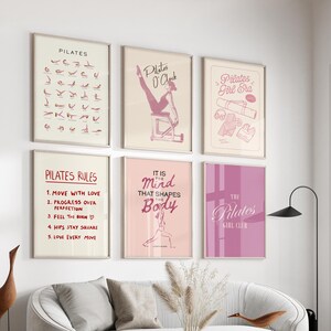 May include: A collection of six framed Pilates-themed art prints. The prints feature illustrations of Pilates exercises, inspirational quotes, and the words "Pilates," "Pilates O'Clock," "Pilates Girl Era," "Pilates Rules," "It is the Mind that Shapes the Body," and "The Pilates Girl Club."
