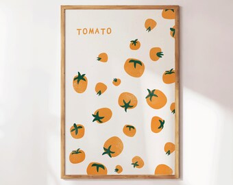 May include: A framed art print featuring a repeating pattern of orange tomatoes with green stems on a white background. The word "TOMATO" is printed in orange at the top. The frame is made of wood.