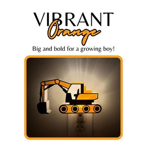 May include: A plug-in night light shaped like a yellow and black excavator, emitting a warm glow from behind its silhouette. The text VIBRANT Orange and Big and bold for a growing boy! appears above the illuminated construction vehicle graphic.