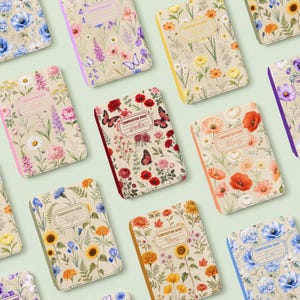 May include: A collection of rectangular composition books featuring beige covers with various floral and butterfly patterns. Each book has a central label with the text Composition Book and a colored spine. The designs include poppies, sunflowers, daisies, and butterflies in vibrant colors.