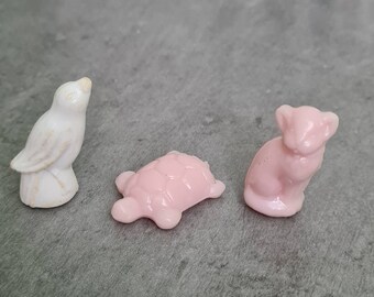 Three plastic figures