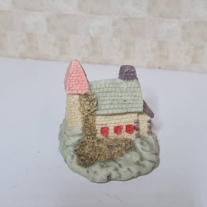 figura de casa en miniatura