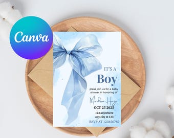 May include: A baby shower invitation with a watercolor blue bow design and the text "IT'S A Boy". The invitation includes the name "Madson Haye", the date "OCT 25 2025", and RSVP information. The invitation is on a wooden tray.