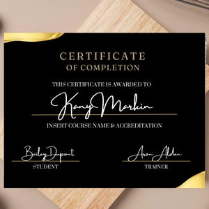 May include: A black certificate with gold accents. The text "CERTIFICATE OF COMPLETION" is at the top. The certificate is awarded to "Kany Markin". Includes lines for course name and accreditation, and signatures for student and trainer.