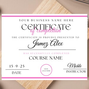 May include: A certificate of completion with a pink border and text. The certificate includes the text "YOUR BUSINESS NAME HERE", "CERTIFICATE of completion", "THE CERTIFICATE IS PROUDLY PRESENTED TO Jamez Alex", "COURSE NAME", "DATE", and "INSTRUCTOR".