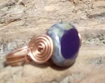 Antique copper wire wrapped ring with a handcrafted Purple Yam Czech Picasso Window Pebble Glass Bead