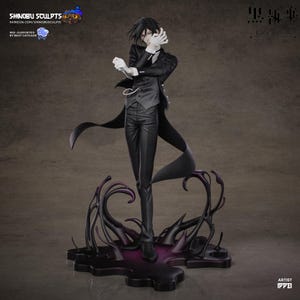 May include: A detailed figurine of a character in a black suit, white gloves, and a long coat. The figure stands on a dark, stylized base with purple accents. The figure's hair is black, and the overall aesthetic is anime-inspired.