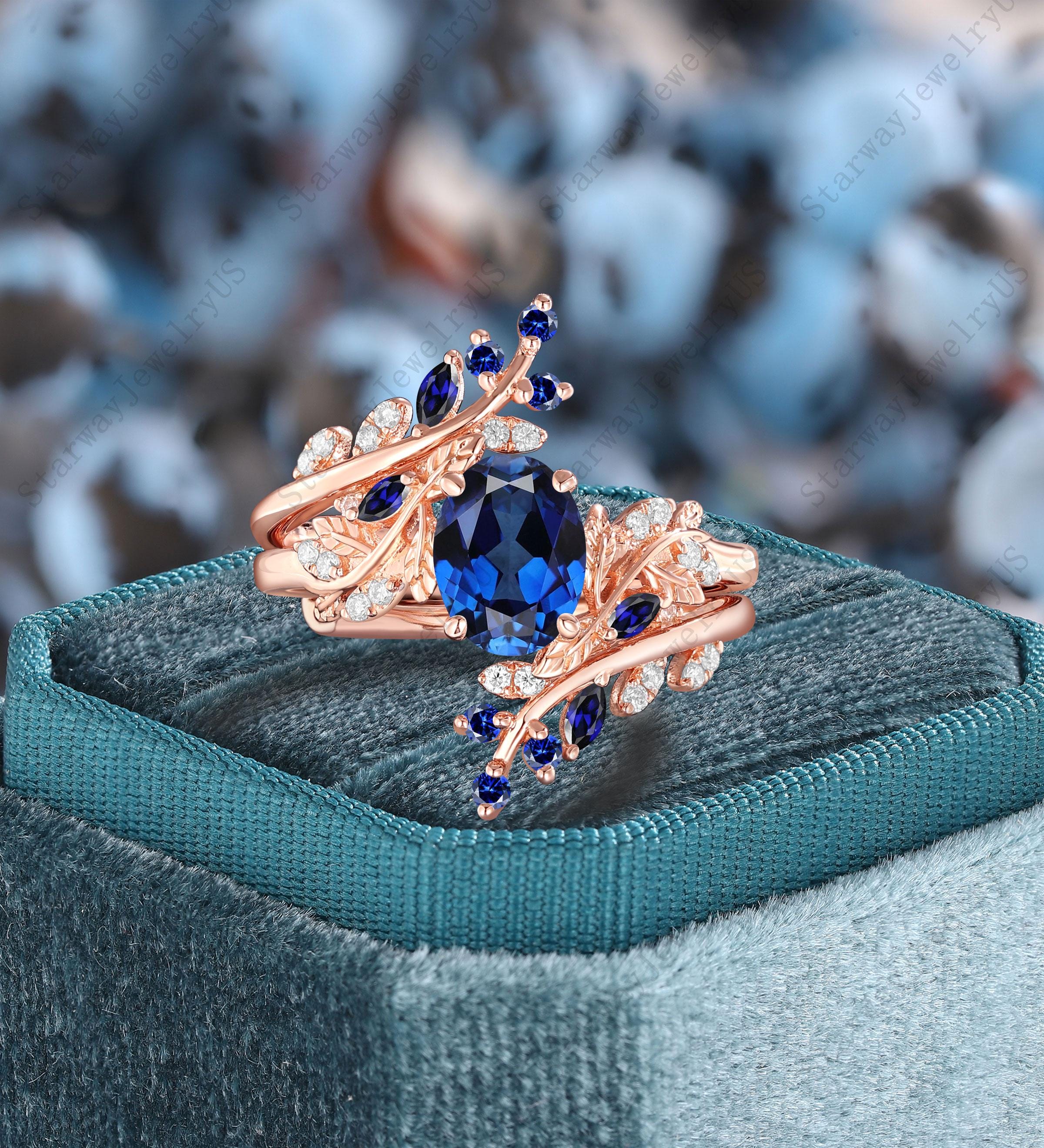 ユニークなオーバルカットのブルーサファイアエンゲージリングセット
