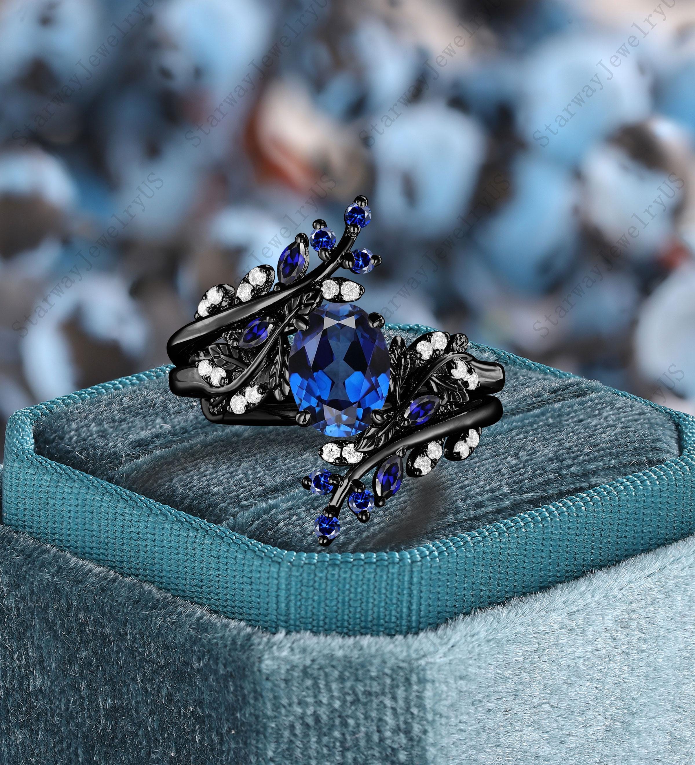 ユニークなオーバルカットのブルーサファイアエンゲージリングセット