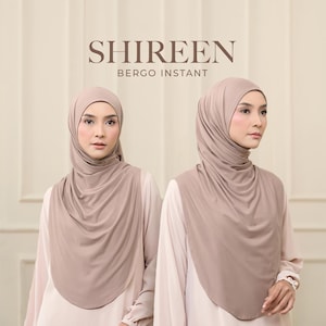 May include: Two women wearing taupe-coloured hijab headscarves. The headscarves are draped in a soft, flowing style. The image includes the text "SHIREEN" above "BERGO INSTANT". The women are wearing light-coloured blouses.