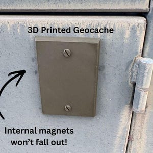 May include: A rectangular 3D printed geocache cover in a matte olive green finish, featuring two flat-head screws and a smooth surface. The text 3D Printed Geocache and Internal magnets won't fall out! is visible along with a black arrow graphic.