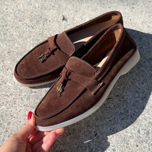 Italian style suede loafers for women featuring premium suede, slip-on design and comfortable everyday fit.