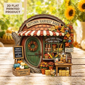 Puede incluir: Un adorno 2D plano impreso de Autumn Harvest Barn con una puerta verde con corona, una ventana con productos y un letrero que dice Today's Specials: Hayrides & Gourds. Una caja etiquetada Farm Fresh Gourds se encuentra junto a una mesa con un farol.