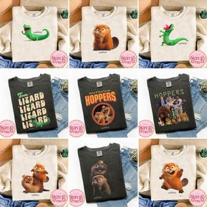 Puede incluir: Colección de camisetas y sudaderas con personajes de dibujos animados y la palabra "HOPPERS". Los diseños incluyen un lagarto verde, un castor marrón y un grupo de personajes. Las camisetas son de varios colores.