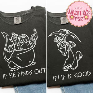 May include: Two dark grey t-shirts with white graphic designs. One shirt features a cartoon demon with the text "IF HE FINDS OUT." The other shirt has a cartoon gargoyle with the text "IF! IF IS GOOD."