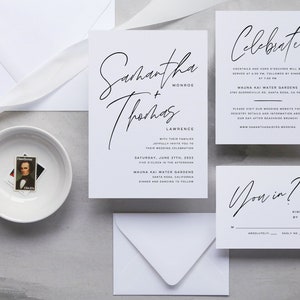 May include: Wedding invitation suite with white envelopes and a white bowl with a stamp. The invitation card features a black and white calligraphy design with the names Samantha Monroe and Thomas Lawrence. The text reads "Celebrate" and "You in?" with a RSVP date of May 15th.