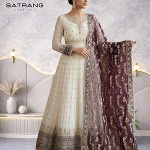 white dress with red dupatta White sharara with red dupatta