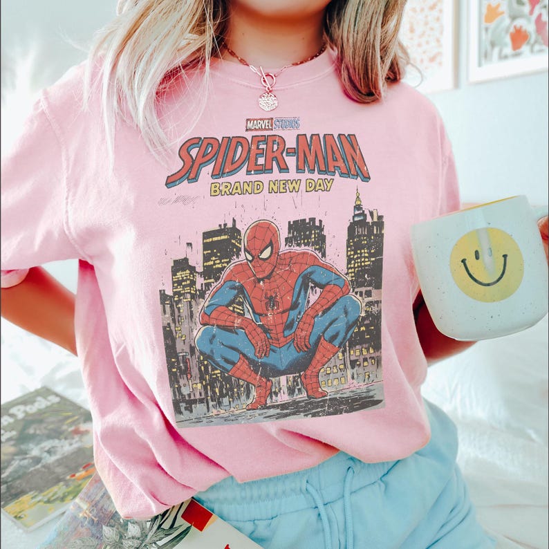 May include: A set of three ceramic mugs with a speckled, matte finish. The mugs are in shades of cream, light gray, and dark gray. Each mug has a simple, minimalist design, perfect for coffee or tea.