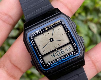 Vintage Rare Casio Multifunction Analog Digital Quartz 694 AE-11W Alarm function 1985 Wristwatch for Men's