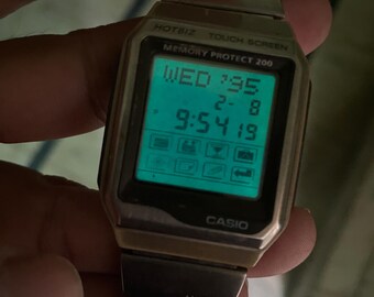 Vintage Rare Casio Hotbiz Touch Screen Digital Quartz 1554 VDB