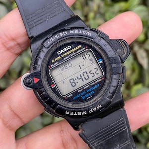 Vintage Rare 1990 Casio Map Meter Digital Quartz 693 MAP-100 Japan Made Wristwatch for Men's Broken From one Side