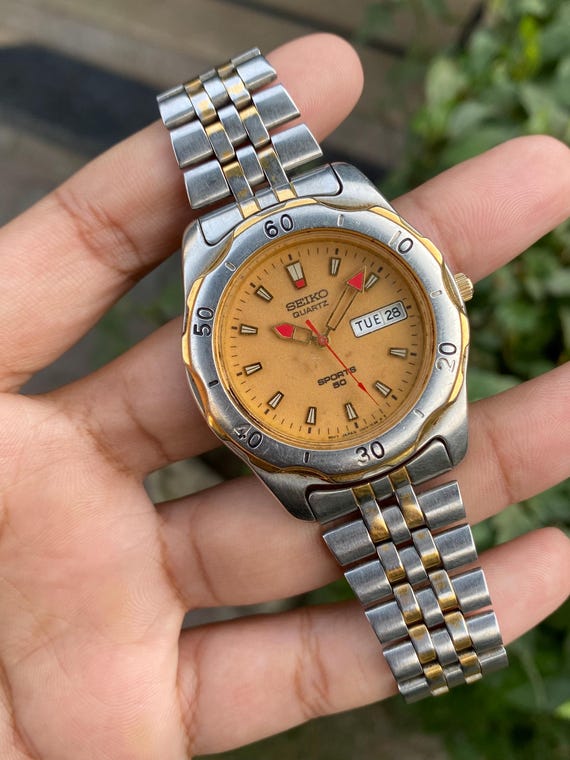 Vintage Nov 1994, Seiko SQ SPORTS 50 Quartz Two Tone Luminous Dial 