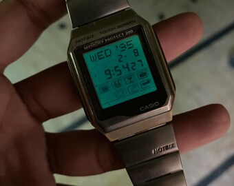 Vintage Rare Casio Hotbiz Touch Screen Digital Quartz 1554 VDB
