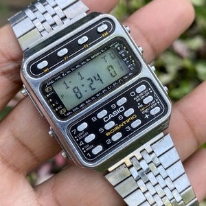 Vintage sällsynt Casio vetenskaplig kalkylator digital kvarts 197 CFX-200 alarmfunktion, bakgrundsbelysning, Japantillverkad armbandsur för herr