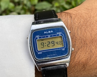 Reloj de pulsera vintage clásico Alba by Seiko Slim LCD digital de cuarzo Y740-5000, fabricado en Japón, para hombre.