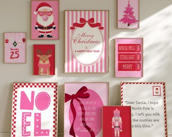 May include: A collection of framed Christmas-themed art prints in pink and red. The prints feature Santa Claus, a reindeer, a Christmas tree, and the words "Merry Christmas" and "Noel". Other prints include text from the Bible and a letter to Santa.
