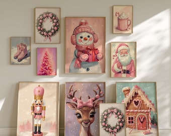 May include: A collection of framed Christmas-themed art prints. The prints feature a snowman, Santa Claus, a deer, a nutcracker, a gingerbread house, ice skates, a Christmas tree, and wreaths, all in soft pink and pastel colors.