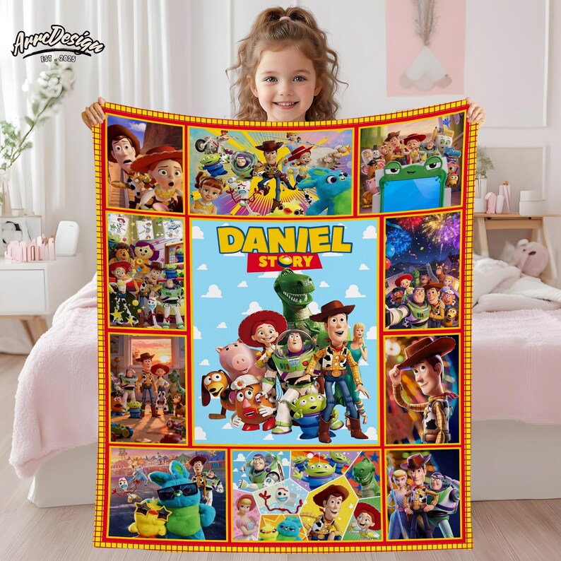May include: A colorful blanket featuring characters from the animated movie "Toy Story." The blanket has a central panel with the name "DANIEL STORY" and is surrounded by smaller panels with various character scenes. The border is red and yellow.