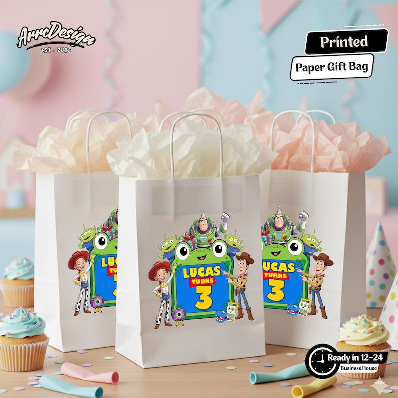 May include: Three white paper gift bags with white handles, each filled with light pink tissue paper. The front of each bag features a colorful graphic of Toy Story characters and a green sign with the text Lucas Turns 3.