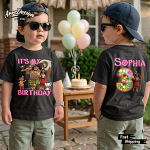 May include: Black t-shirt with a colorful graphic featuring characters from a popular animated movie. The front of the shirt says "IT'S MY BIRTHDAY" in pink. The back of the shirt says "Sophia" and the number "3".