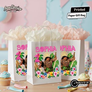 May include: White paper gift bags with handles, featuring a colorful design with the name "Sophia" in pink, a number "2", and a cartoon character. The bags are filled with tissue paper and are ready in 12-24 business hours.