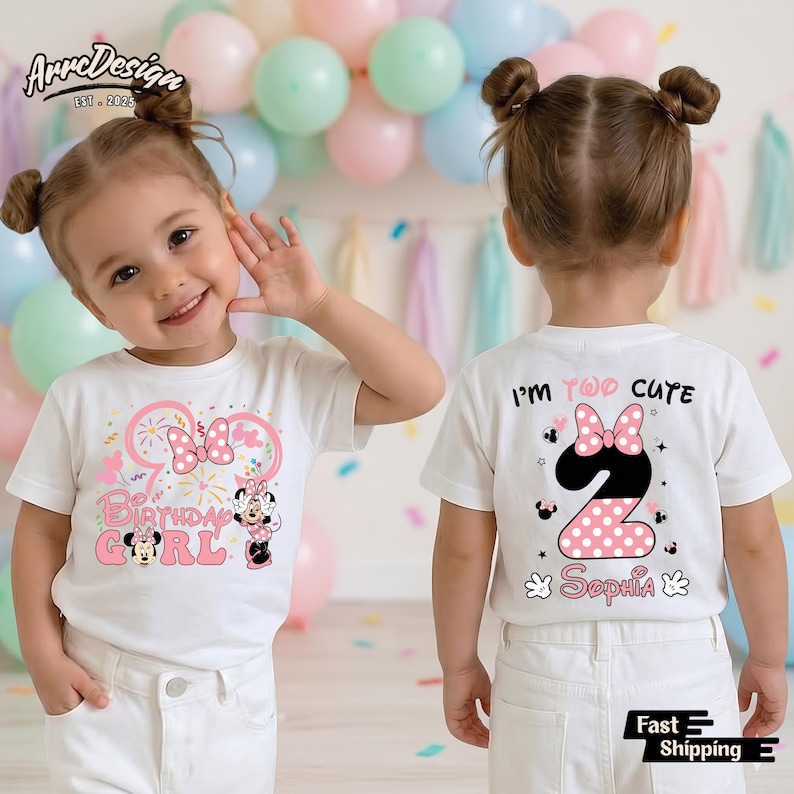 May include: A white t-shirt with a Minnie Mouse-themed design. The front features a pink bow, the words "Birthday Girl", and a Minnie Mouse graphic. The back says "I'm Too Cute" with a number 2 and the name "Sophia".