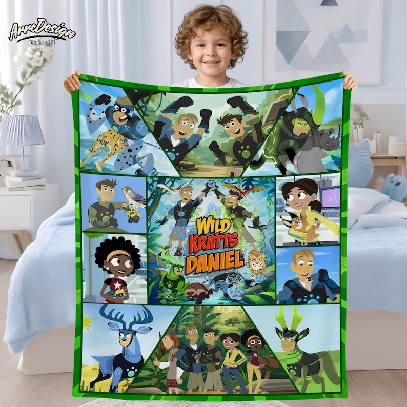 May include: A colorful Wild Kratts blanket featuring various characters and creatures from the animated series. The blanket has a green border and a central design with the show's title. The design includes images of animals and the show's characters.