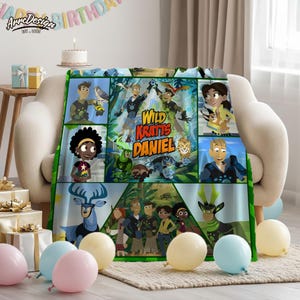 May include: A Wild Kratts Daniel themed blanket featuring cartoon characters and the show's logo. The blanket is primarily green, with various character panels and a central image. The blanket is draped over a cream-colored chair, with balloons and gifts nearby.