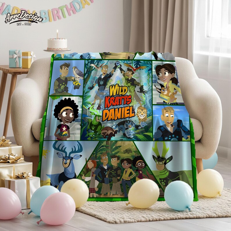 May include: A Wild Kratts Daniel themed blanket featuring cartoon characters and the show's logo. The blanket is primarily green, with various character panels and a central image. The blanket is draped over a cream-colored chair, with balloons and gifts nearby.