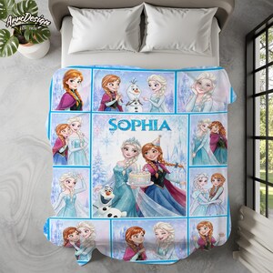 May include: A fleece blanket featuring a collage of Frozen characters including Anna, Elsa, and Olaf in various scenes. The center panel displays the name Sophia in blue text above an illustration of Elsa and Anna holding a birthday cake.