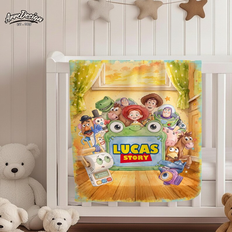 May include: A rectangular blanket featuring a colorful illustration of various animated characters from the Toy Story franchise surrounding a central green frog-shaped frame with the text LUCAS STORY printed in bold yellow and red letters.