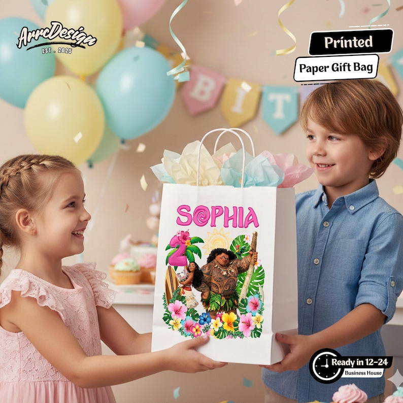 May include: White paper gift bag with the name "SOPHIA" in pink, featuring a colorful illustration of characters and tropical flowers. The bag has white handles and is filled with tissue paper. The words "Printed Paper Gift Bag" are printed on the top right.