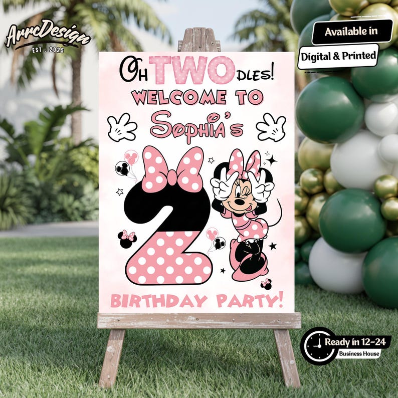 May include: A pink and white birthday party sign featuring Minnie Mouse. The sign says "Oh Twodles! Welcome to Sophia's Birthday Party!" and includes the number 2 with a polka dot bow. The sign is on a wooden easel.
